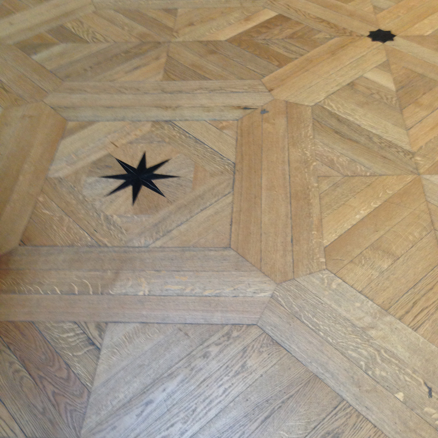 Hardwood with inlay stars at the Louvre
